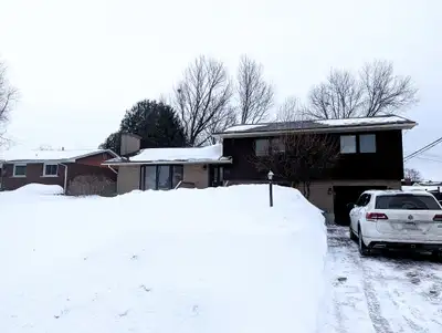 Palatial multi split level residence with beautiful kitchen, large basement, and outdoor three seaso...
