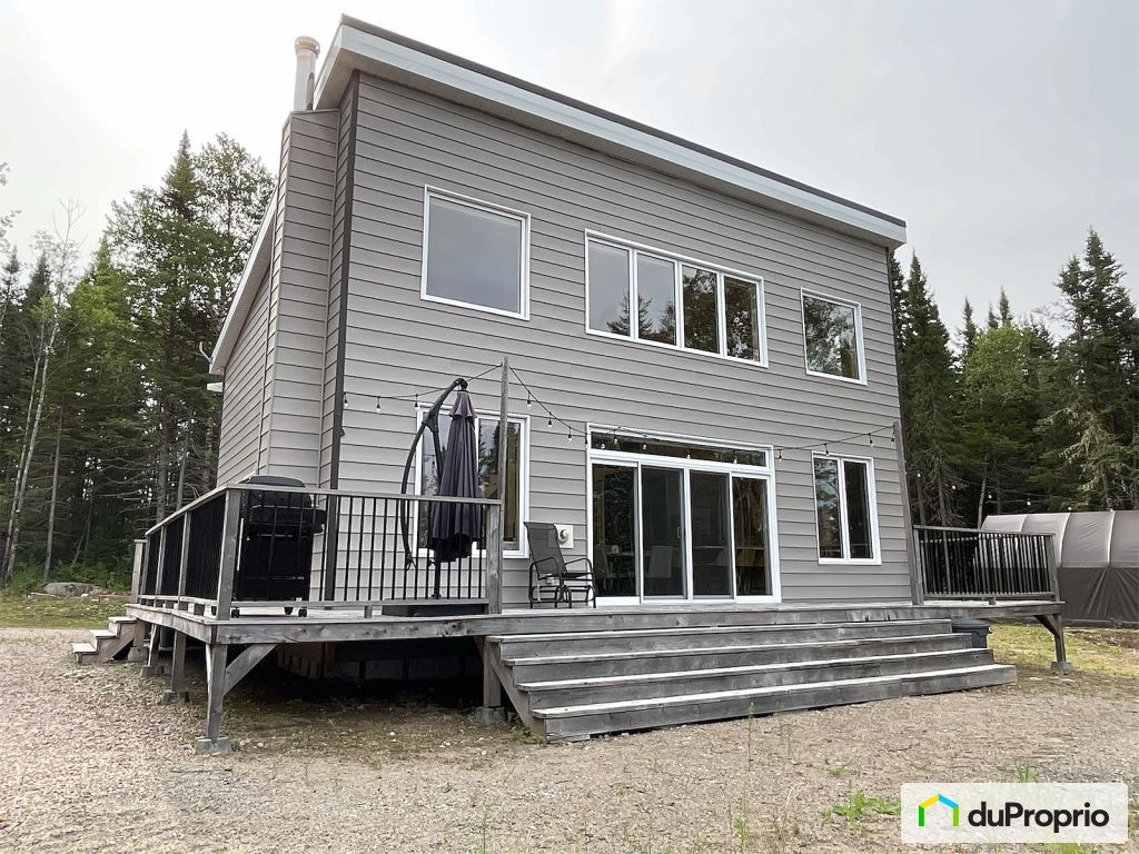 $398,999 - Cottage for sale in St-Andre-Du-Lac-St-Jean — photo 1
