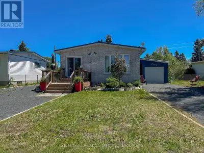 Spacious and well cared for, this 2+3 bedroom bungalow offers plenty of room on both levels. The mai...