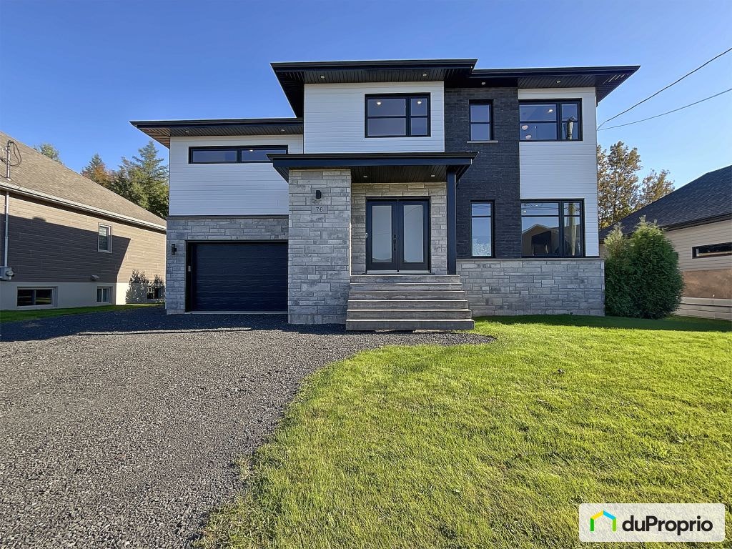 $764,000 - 2 Storey for sale in St-Apollinaire — photo 1