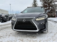 The 2018 Lexus RX 350 is a mid-size luxury SUV that strikes a balance between sharp, aggressive styl... (image 3)