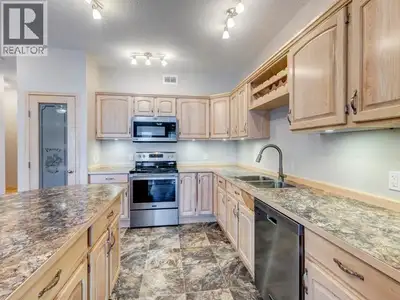 Gorgeous townhome built by Whitewater Homes! End unit, Easterly-facing backyard & holds a 'Super Gre...