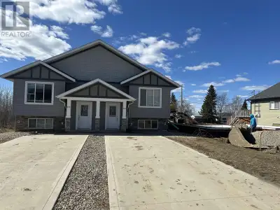 Stunning 5-Bedroom duplex with In-Law suite. Discover this spacious half-duplex, featuring 5 bedroom...