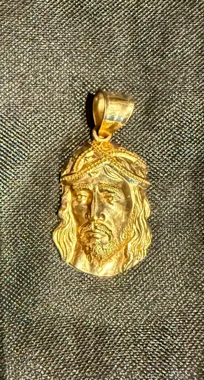 We are selling a 10K gold Jesus pendant ♦Tested as 10K ♦2.1 grams/approx. 1" without bail CJ’s Pawn...