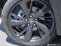 Elevate every journey in this stunning 2024 Buick Envision Sport Touring, featuring an expansive sun... (image 5)