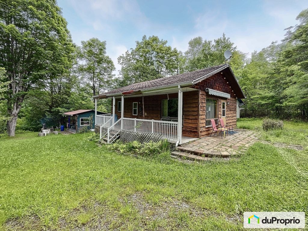 $435,000 - Cottage for sale in Lac-Aux-Sables — photo 1