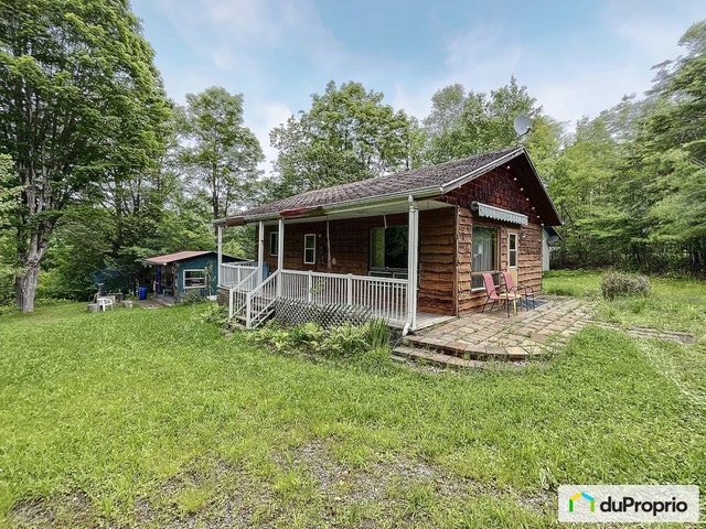 $435,000 - Cottage for sale in Lac-Aux-Sables — photo 1