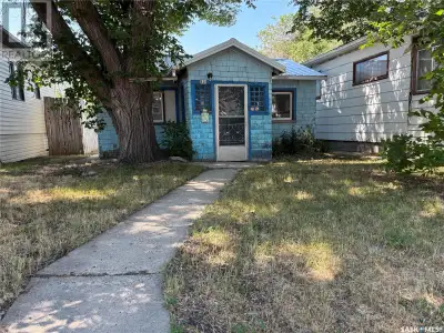 This cozy 704 sq. ft bungalow home with a mid-efficient furnace, metal roof. It is partially fenced...