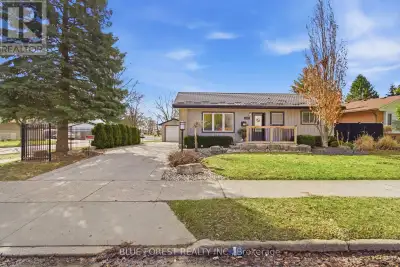 A detached bungalow with finished living space, a garage, an incredible backyard and so much versati...