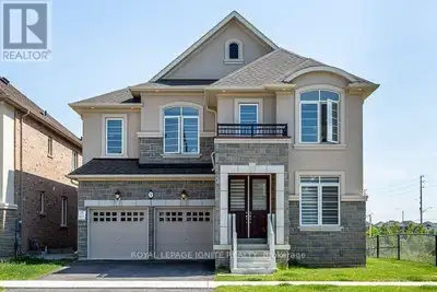 Stunning stone and brick exterior on this fully detached 4-bedroom, 4-washroom home offering approx....