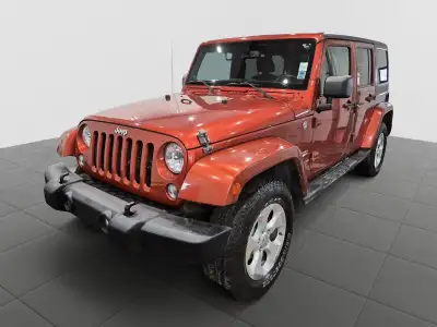 Seize the freedom with the iconic 2014 Jeep Wrangler Unlimited Sahara, a legendary 4x4 offering prov...