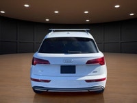 The 2021 Audi Q5 Komfort 45 TFSI quattro boasts a stunning white exterior that is both timeless and... (image 6)
