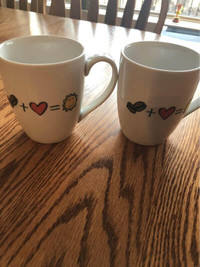 Two Cora coffee mugs made by Danesco!