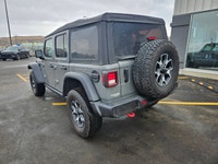 The 2022 Jeep Wrangler Unlimited Rubicon 4x4 in striking Gray awaits you with its robust handling an... (image 6)