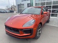 The 2023 Porsche Macan AWD, finished in eye-catching Papaya Metallic, brings true sports car DNA int... (image 2)