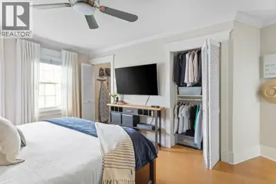 Private three-level townhome located in the private Wemsley Mews community. Functional layout with o...