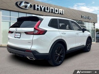 The 2026 Honda CR-V Hybrid Touring isn't just an SUV; it's your efficient and sophisticated partner... (image 4)