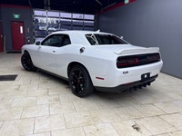 Experience the thrill of driving the 2020 Dodge Challenger SXT in stunning White. This RWD coupe bri... (image 5)