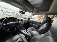 The 2013 Buick Enclave Premium AWD is a full-size luxury crossover that underwent a significant refr... (image 6)