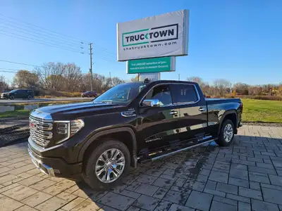 2023 GMC Sierra 1500 Denali 4x4 Crew, which boasts a low 83,769 km and the commanding presence of th...