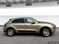 The 2015 Porsche Macan comes equipped with all-wheel drive, heated leather seats, a heated steering... (image 5)