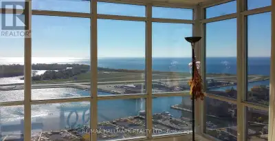 Breathtaking Views from Every Angle! Welcome to this stunning corner unit offering rare, unobstructe...