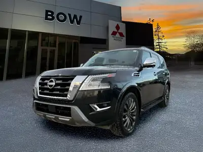 The 2023 Nissan Armada 4x4 Platinum in a striking black finish is a powerhouse SUV designed for both...
