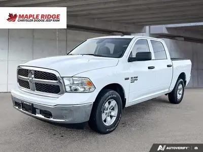 This commanding 2023 Ram 1500 Classic SLT Crew Cab Pickup, shimmering in Bright White with a functio...