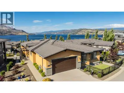 Discover the perfect blend of luxury, comfort, and Okanagan living in this stunning walk-out rancher...
