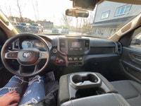 The 2021 Ram 1500 Tradesman in a stunning white finish offers impressive 4x4 capabilities for incred... (image 6)