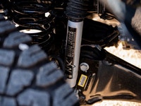 Adds: 2 Inch BDS Lift With NX Shocks & Black Shock Boots 20x10 Hostile Typhoon Wheels 35X12.50R20 Yo... (image 2)