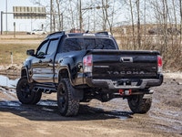 This Toyota is a tough and reliable midsize truck that is built for both everyday driving and off-ro... (image 6)