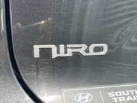 AMVIC Licensed Dealer The 2025 Kia Niro EX FWD, finished in Interstellar Grey, is a smart and effici... (image 6)