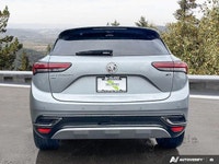 This 2023 Buick Envision Essence SUV is a head-turner, boasting a sleek Moonstone Grey Metallic exte... (image 3)