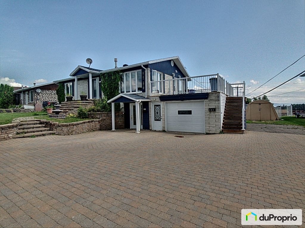 $499,000 - Bungalow for sale in La Baie — photo 1