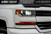 The 2018 Chevrolet Silverado 1500 LT in white offers the perfect balance of robust power and refined... (image 1)