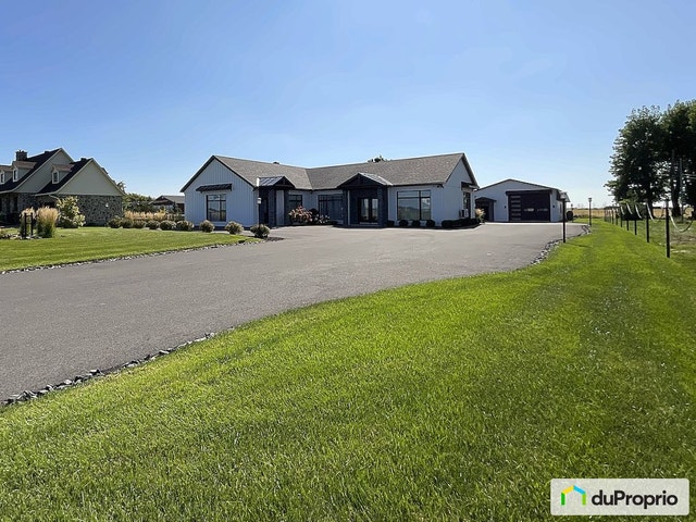 $1,345,000 - Bungalow for sale in Calixa-Lavallee — photo 1