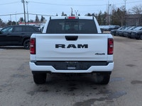 The 2026 Ram 1500 Black Express Crew Cab combines practical capability with a clean, modern design.... (image 4)