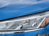 Command attention in this former daily rental vibrant Electric Blue Metallic 2024 Nissan Kicks SV, e... (image 5)