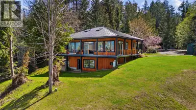 Waterfront acreage. Beautiful, contemporary, Off Grid 2,400 SQFT home thoughtfully built at the top...