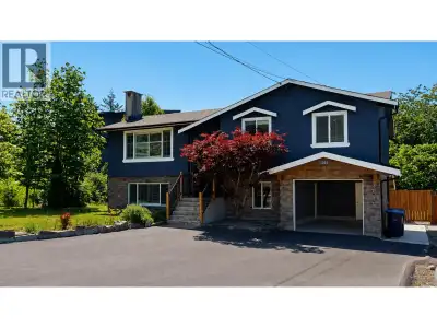 Split level, 5 bedroom, 2.5 bathroom home in the heart of Brackendale- including a two bedroom suite...