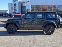 This Jeep Wrangler has a strong Regular Unleaded V-6 3.6 L/220 engine powering this Automatic transm... (image 4)