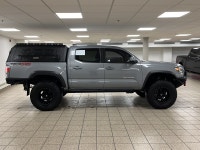 Built to outwork expectations and outplay the weekend, this 2021 Toyota Tacoma in Cement proves capa... (image 3)