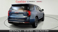 The 2025 GMC Yukon Elevation combines bold styling, spacious versatility and powerful performance in... (image 2)