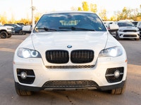 2010 BMW X6 50i with winter tires, Armed Street rims, brown leather interior, heated seats, heated s... (image 5)