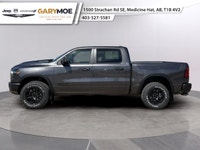 The 2026 Ram 1500 Rebel is the epitome of rugged sophistication. This Gray beauty, equipped with 44... (image 4)