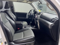 The 2015 Toyota 4Runner 4WD 4dr V6 SR5, in its striking White exterior paired with a robust 44 drive... (image 8)