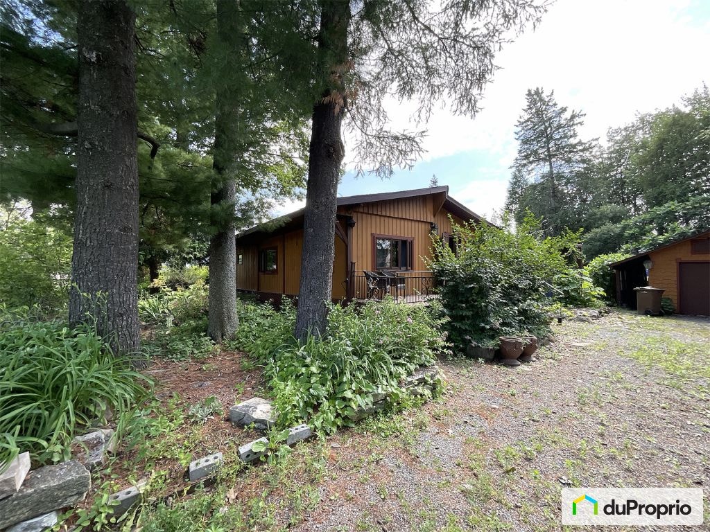$820,000 - Bungalow for sale in L'Assomption — photo 1