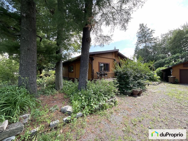 $820,000 - Bungalow for sale in L'Assomption — photo 1
