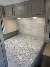 The popular 243RBS is the ideal couple’s coach! This floorplan boasts a full-size super slide with b... (image 7)